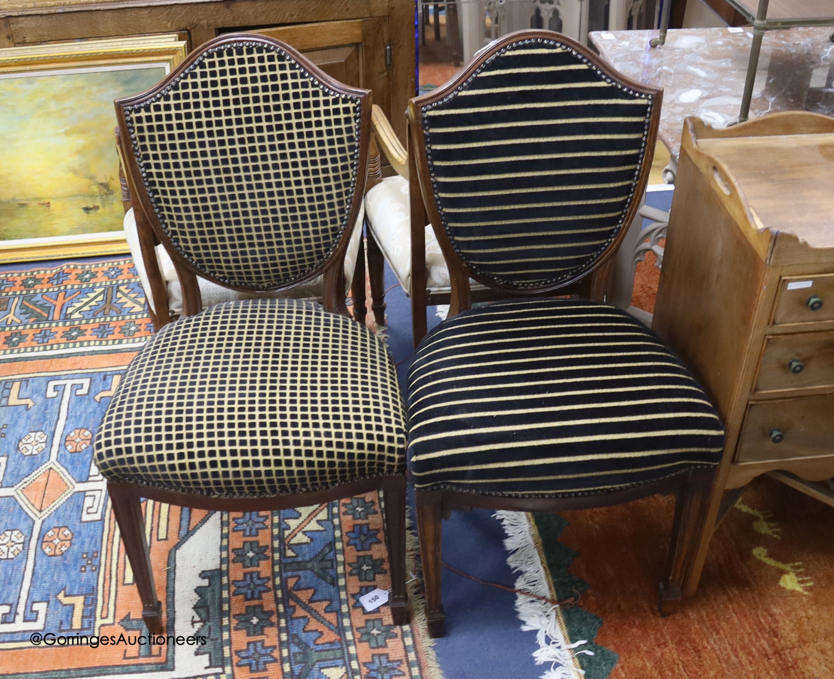 A pair of Edwardian hepplewhite style upholstered dining or side chairs